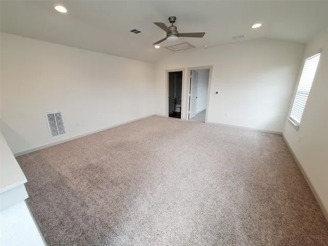 a view of a house with backyard and porch