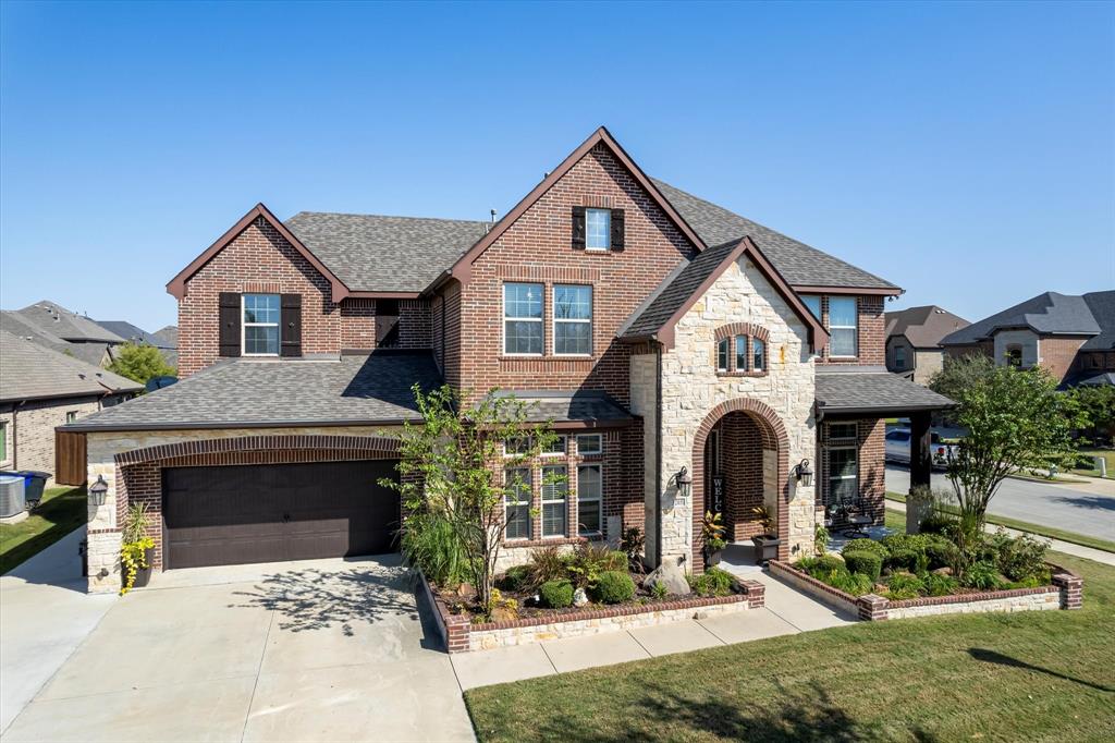 3205 Star Hill Drive Mansfield, TX 76063 - Photo 1 of 1 a front view of a house with a yard