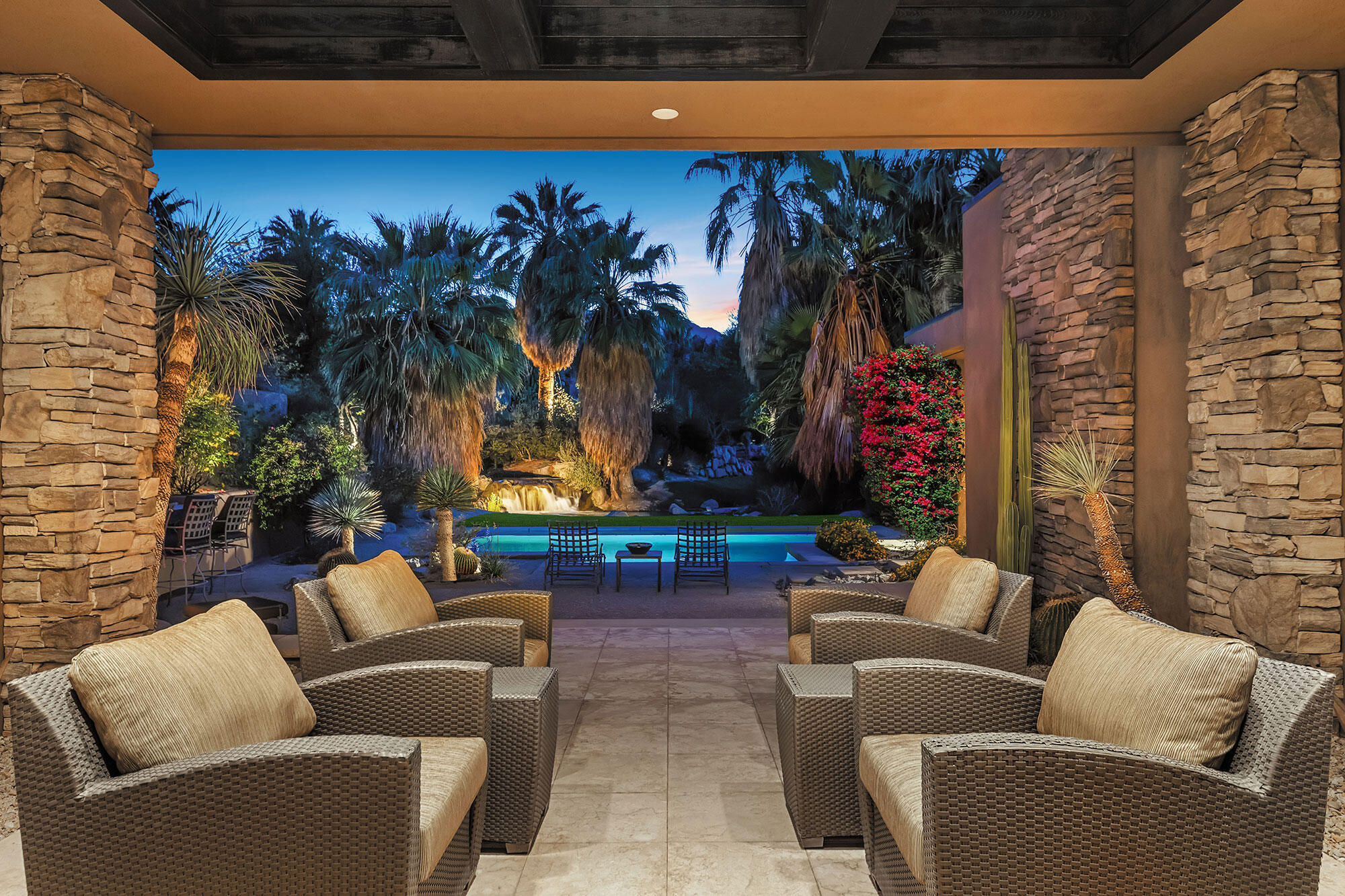 1134 Lake Vista Palm Desert, CA 92260 - Photo 13 of 14 a living room with furniture a lamp and a fireplace