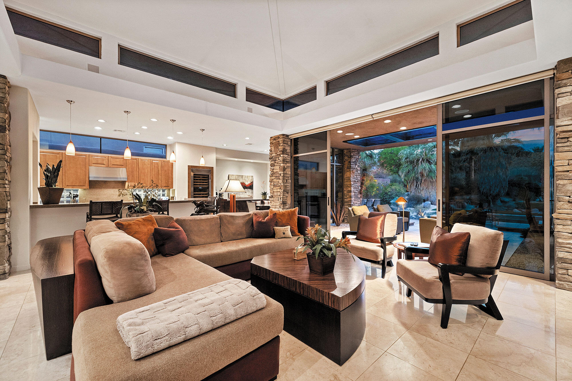 1134 Lake Vista Palm Desert, CA 92260 - Photo 2 of 14 a living room with furniture and a large window