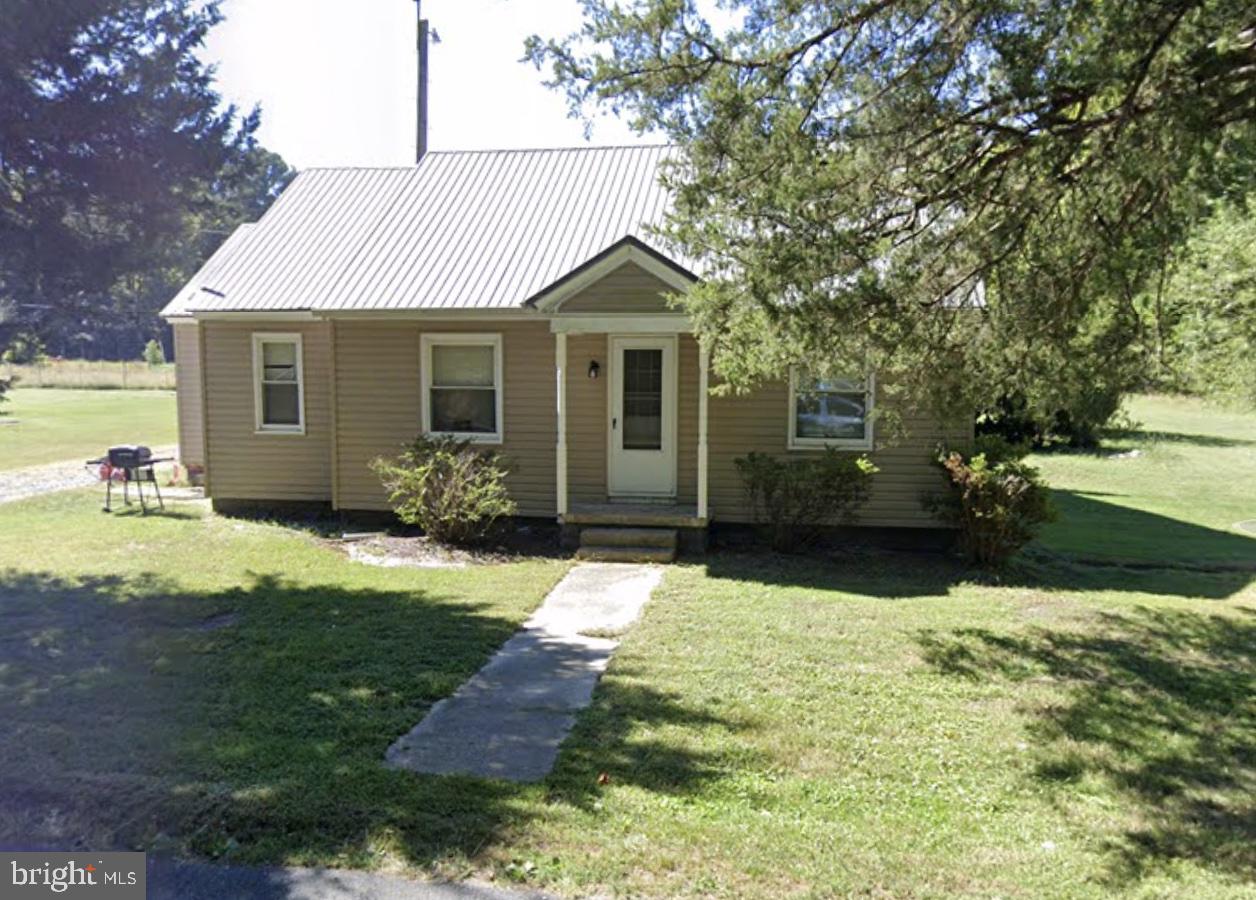820-824 Shad Point Road Salisbury, MD 21801 - Photo 6 of 7 a front view of a house with garden