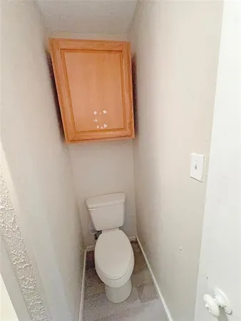 a bathroom with a toilet