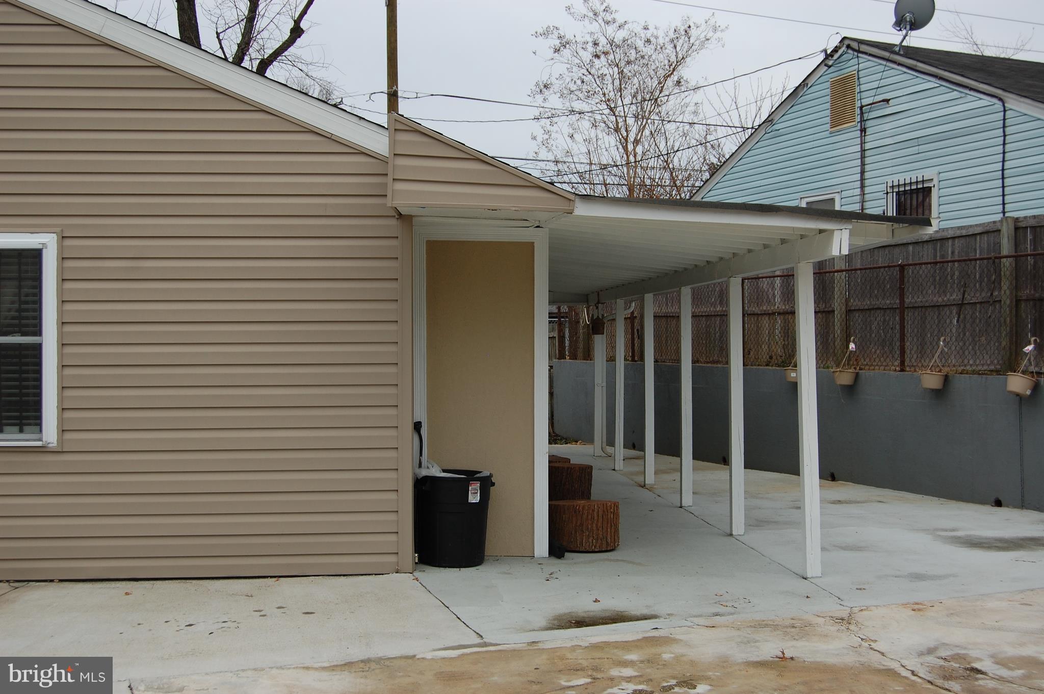 912 Lindsay Road Oxon Hill, MD 20745 - Photo 19 of 27 Partially covered rear patio