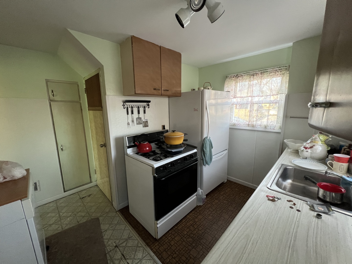 21 McCarthy Road Park Forest, IL 60466 - Photo 8 of 26 a kitchen with stainless steel appliances granite countertop a stove a sink dishwasher and a refrigerator