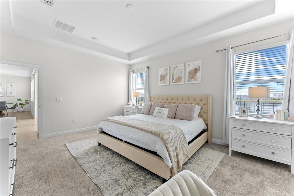 2926 Wordsmith Road Kissimmee, FL 34746 - Photo 27 of 42 a bed room with a bed and a window