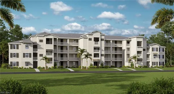 a front view of a building with a garden