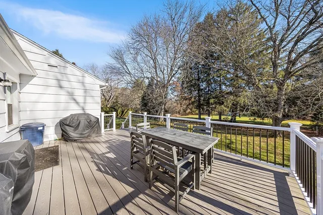 a view of a balcony with chairs