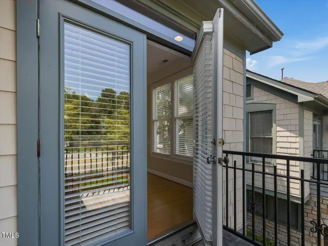 a view of a balcony and a window