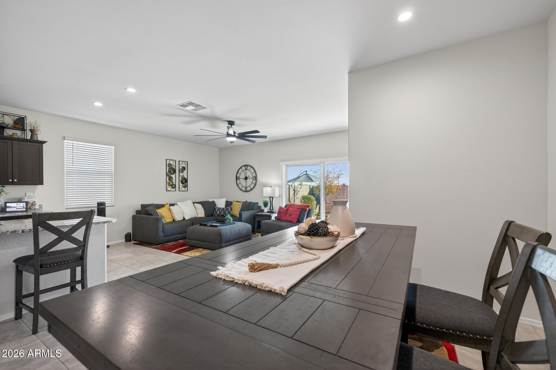 9573 Cotton Road Florence, AZ 85132 - Photo 15 of 46 a living room with furniture and a flat screen tv