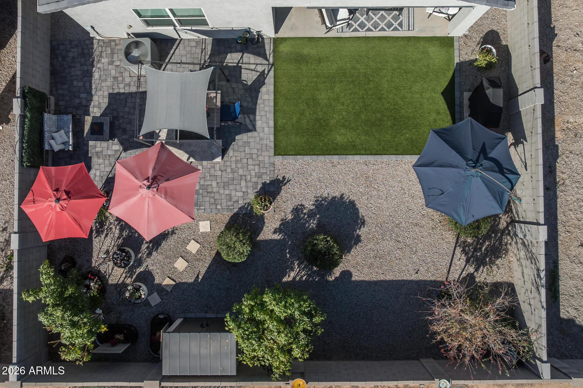 9573 Cotton Road Florence, AZ 85132 - Photo 33 of 46 an aerial view of a house with a garden and plants