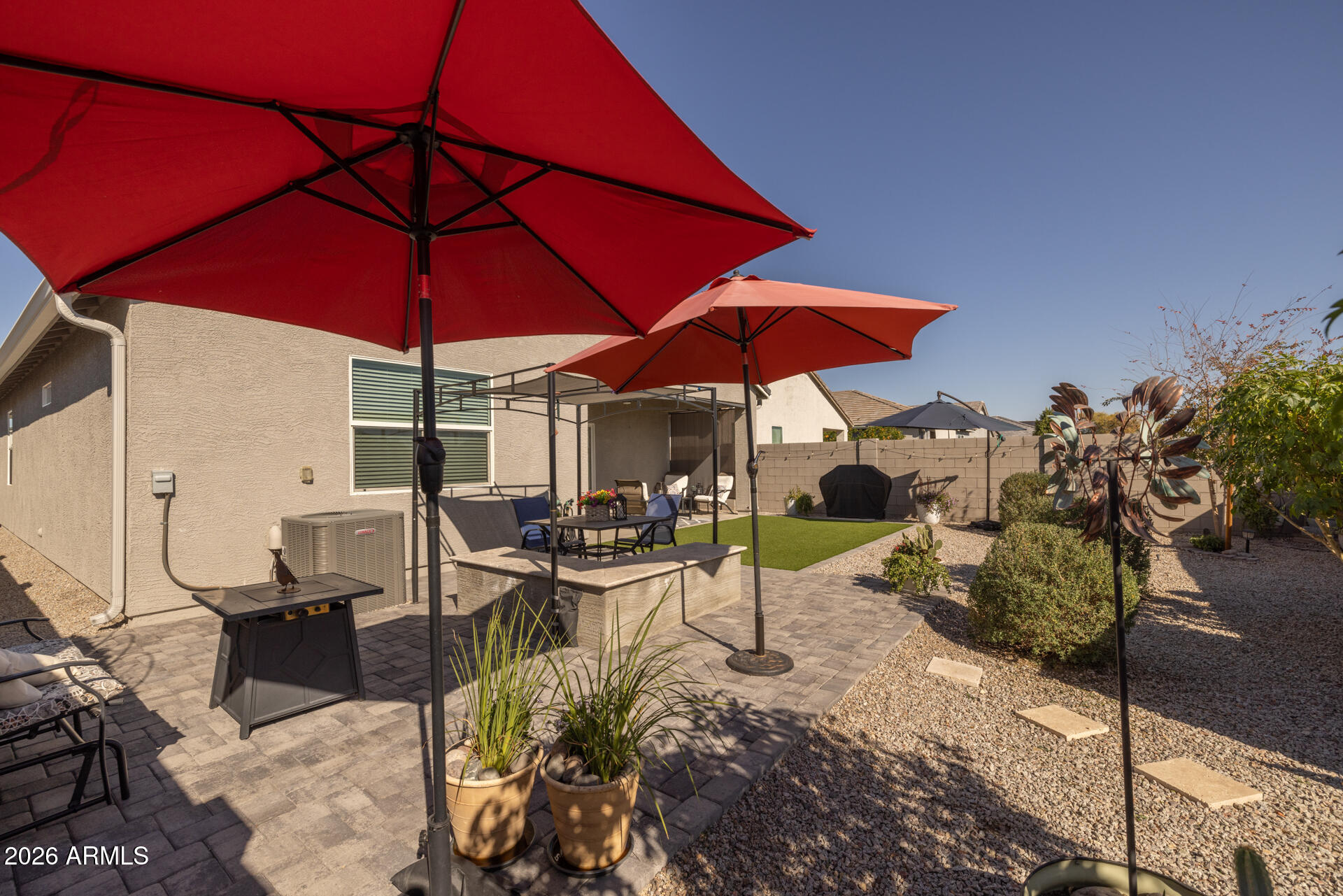 9573 Cotton Road Florence, AZ 85132 - Photo 36 of 46 a view of a backyard with sitting area
