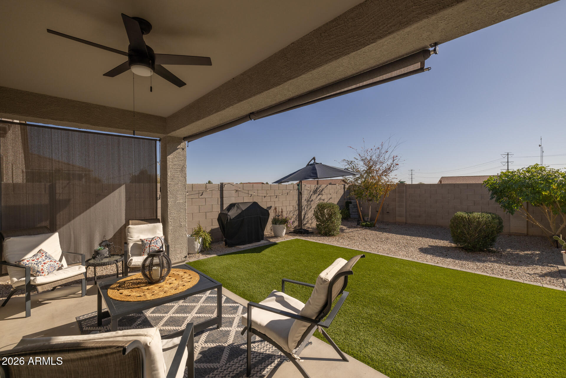 9573 Cotton Road Florence, AZ 85132 - Photo 37 of 46 a backyard of a house with table and chairs