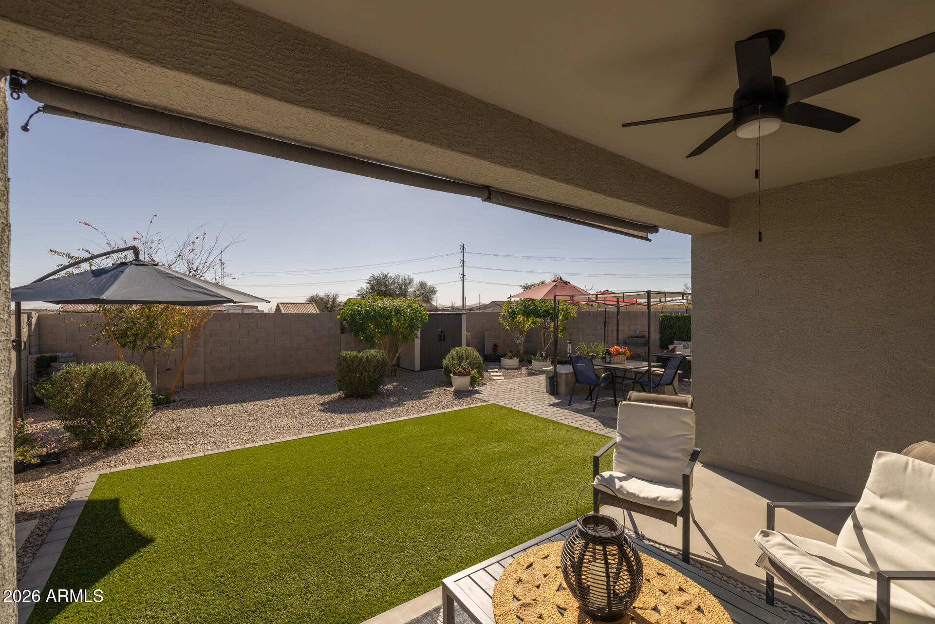 9573 Cotton Road Florence, AZ 85132 - Photo 38 of 46 a view of a swimming pool and lounge chairs