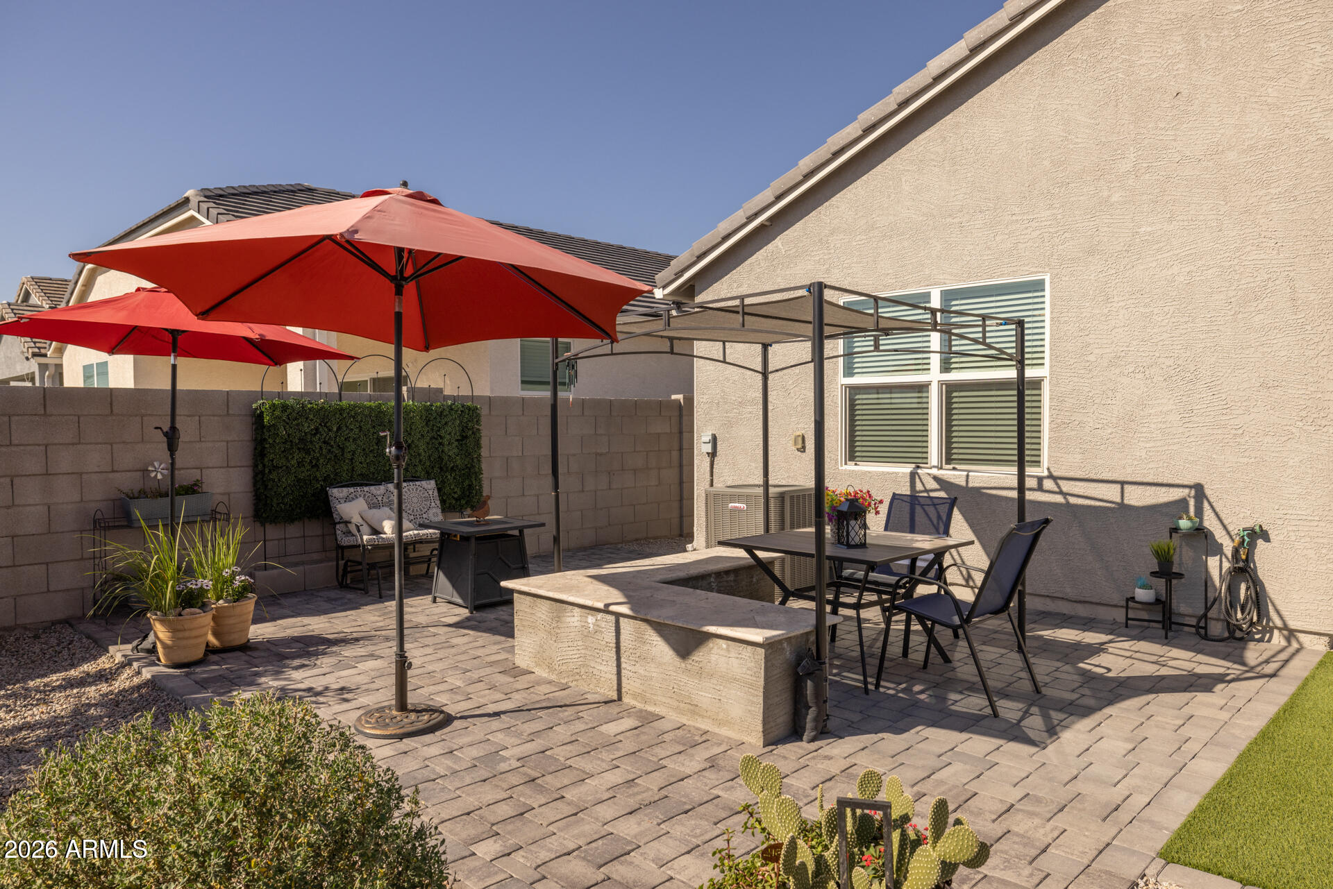 9573 Cotton Road Florence, AZ 85132 - Photo 40 of 46 a view of a dinning table and chairs in the patio