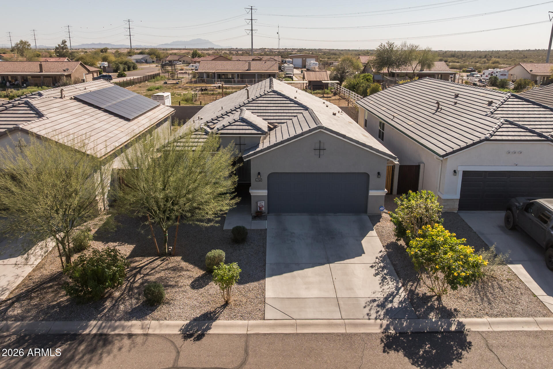 9573 Cotton Road Florence, AZ 85132 - Photo 4 of 46 a picture of a house with a yard