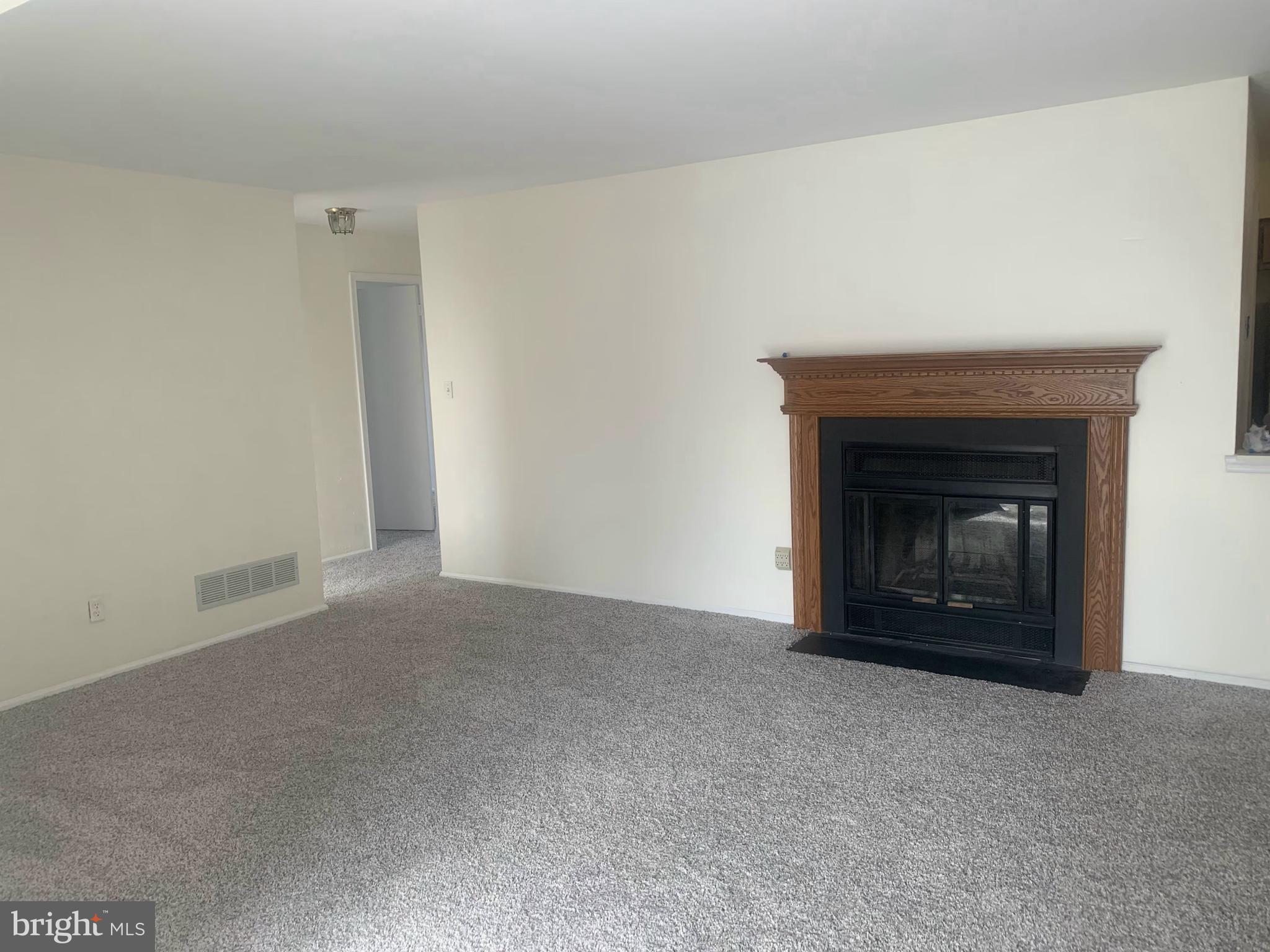 60 B Sumac Court Mount Laurel, NJ 08054 - Photo 1 of 1 a view of an empty room with a fireplace