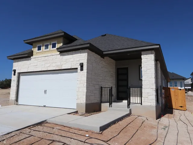 a house view with a outdoor space