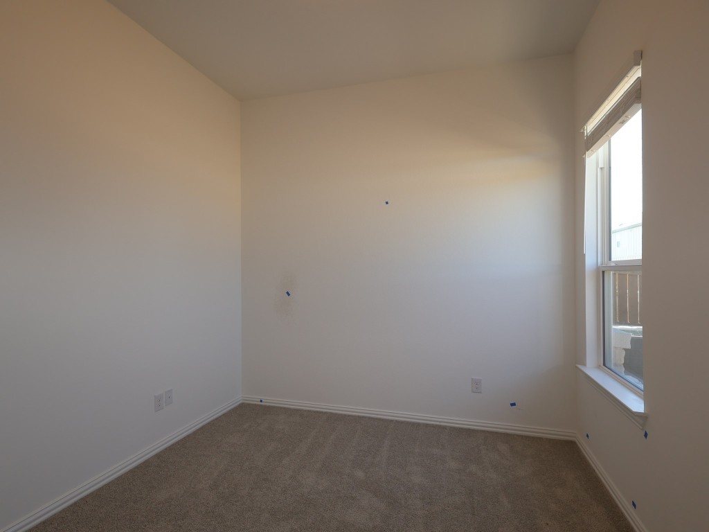 226 Grayson Elm Pass Dripping Springs, TX 78620 - Photo 12 of 23 an empty room with a window
