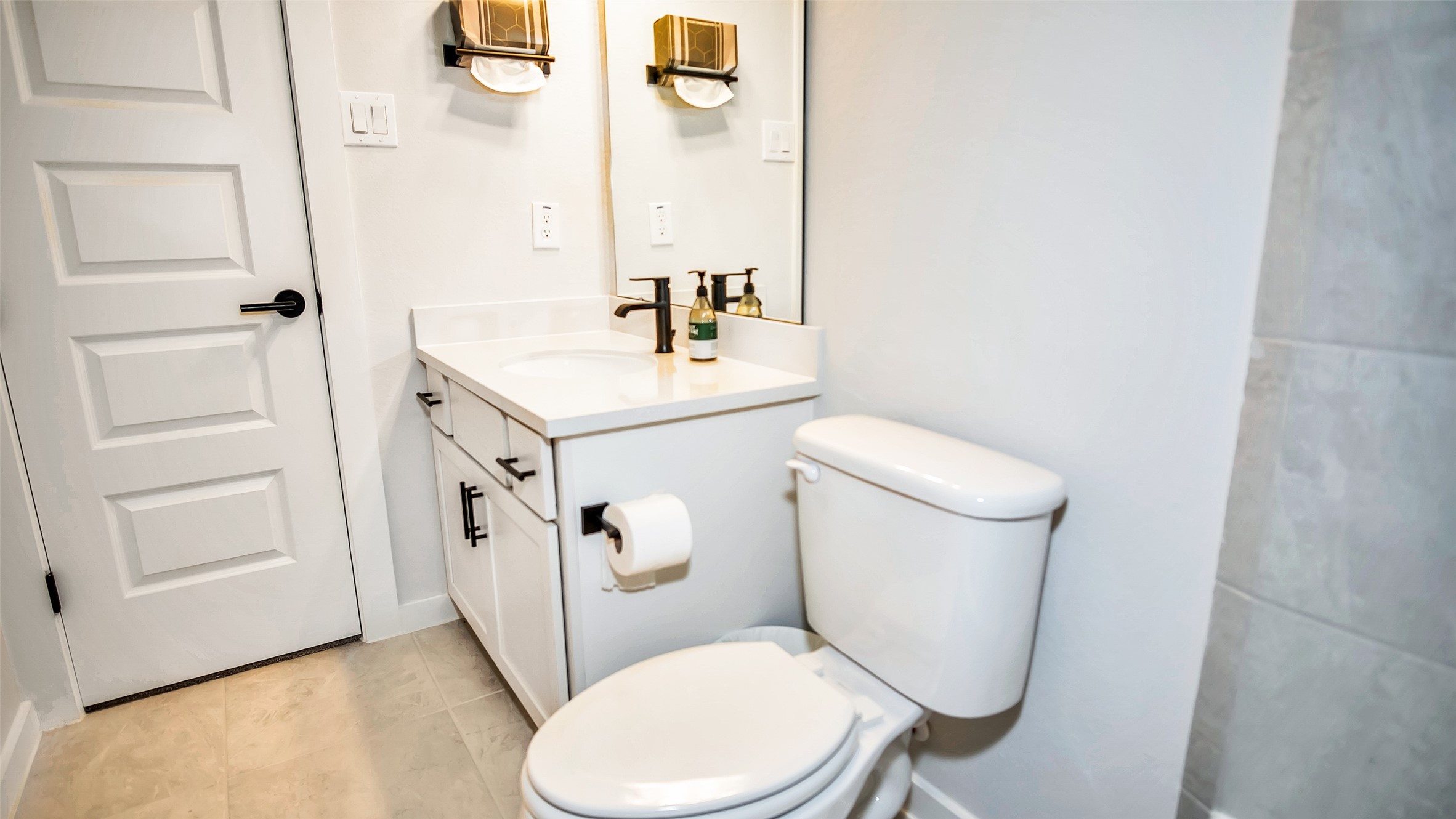 1919 Pueblo Nuevo Path Houston, TX 77077 - Photo 16 of 50 a white toilet sitting next to a bathroom sink