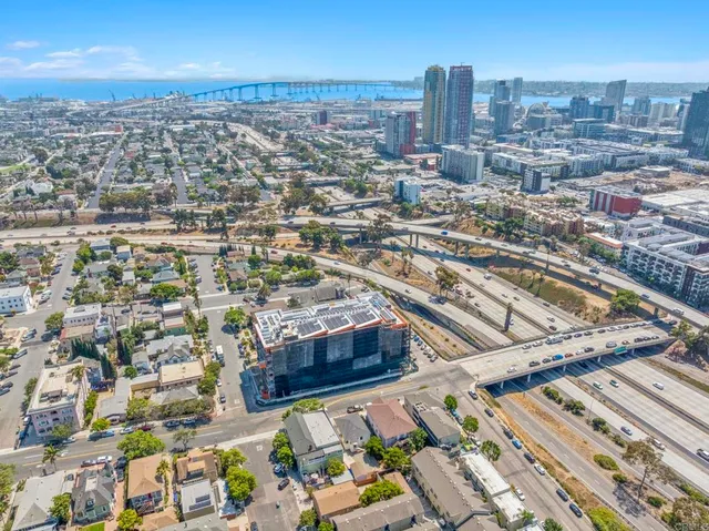 a view of city with ocean