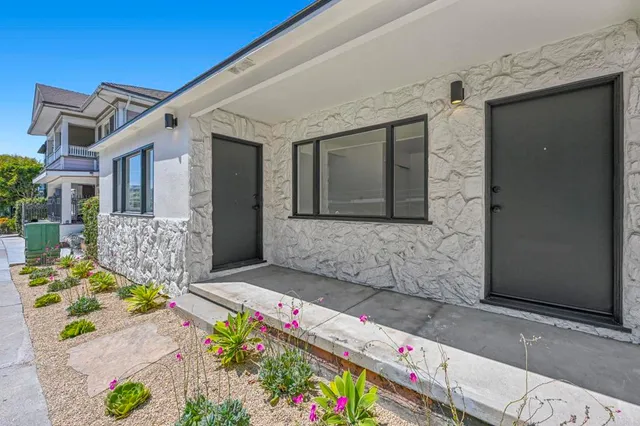 a front view of a house with an outdoor space