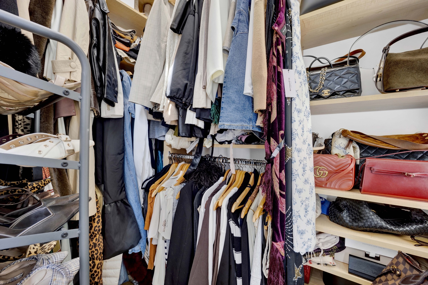 856 West Buckingham Place, Unit 3SW Chicago, IL 60657 - Photo 15 of 23 a view of walk in closet with clothes and shoes