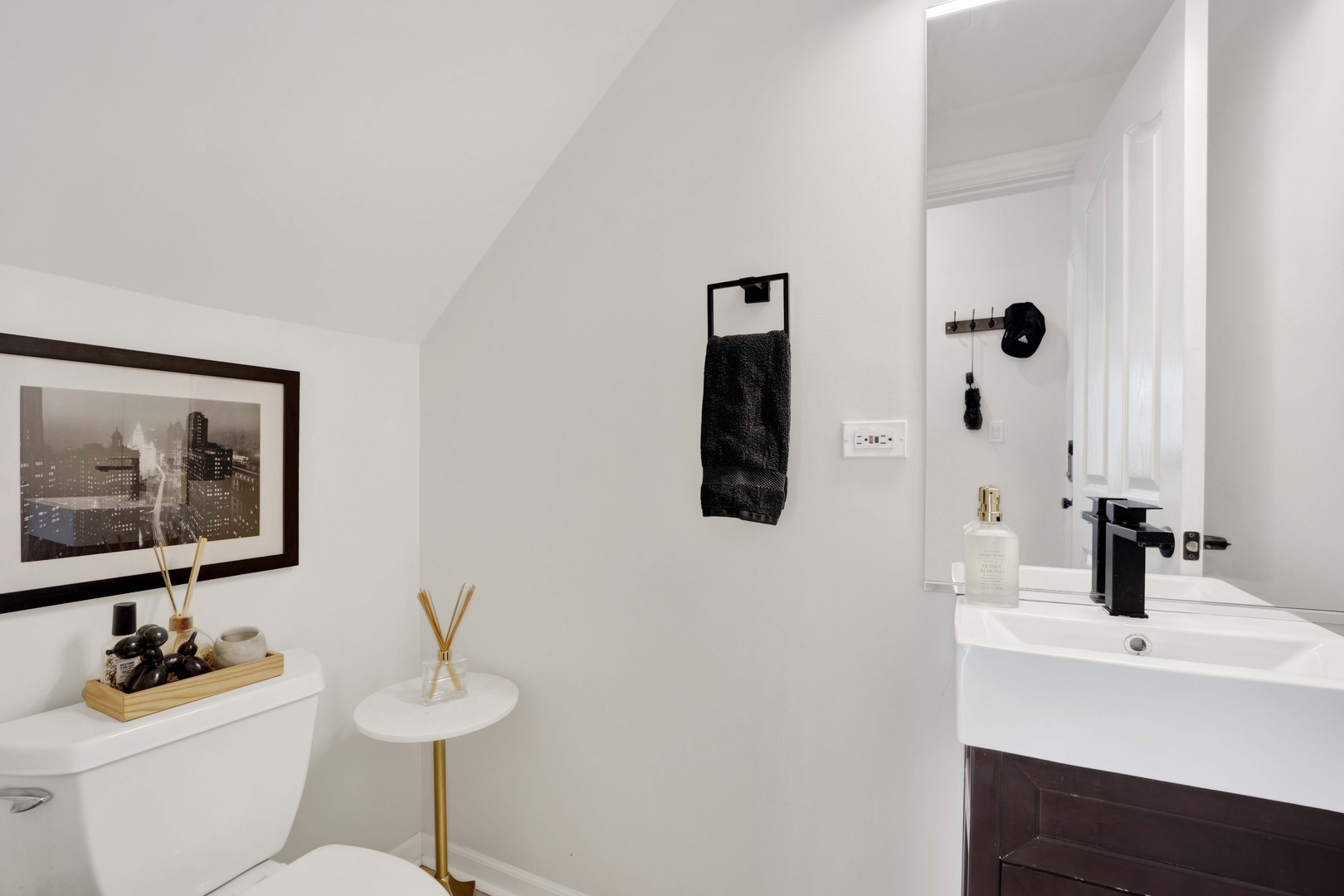 856 West Buckingham Place, Unit 3SW Chicago, IL 60657 - Photo 10 of 23 a bathroom with a sink mirror and toilet
