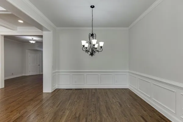 a view of livingroom with hardwood floor and a ceiling fan