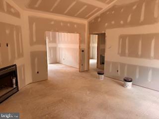 6735 Beverly Road Broad Run, VA 20137 - Photo 22 of 31 an empty room with fireplace and windows