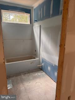 6735 Beverly Road Broad Run, VA 20137 - Photo 23 of 31 a bathroom with a bathtub and a shower