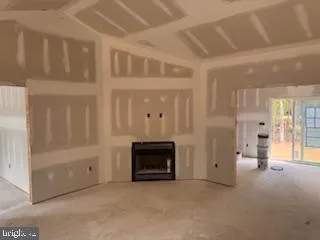 a view of a hallway with wooden shelves