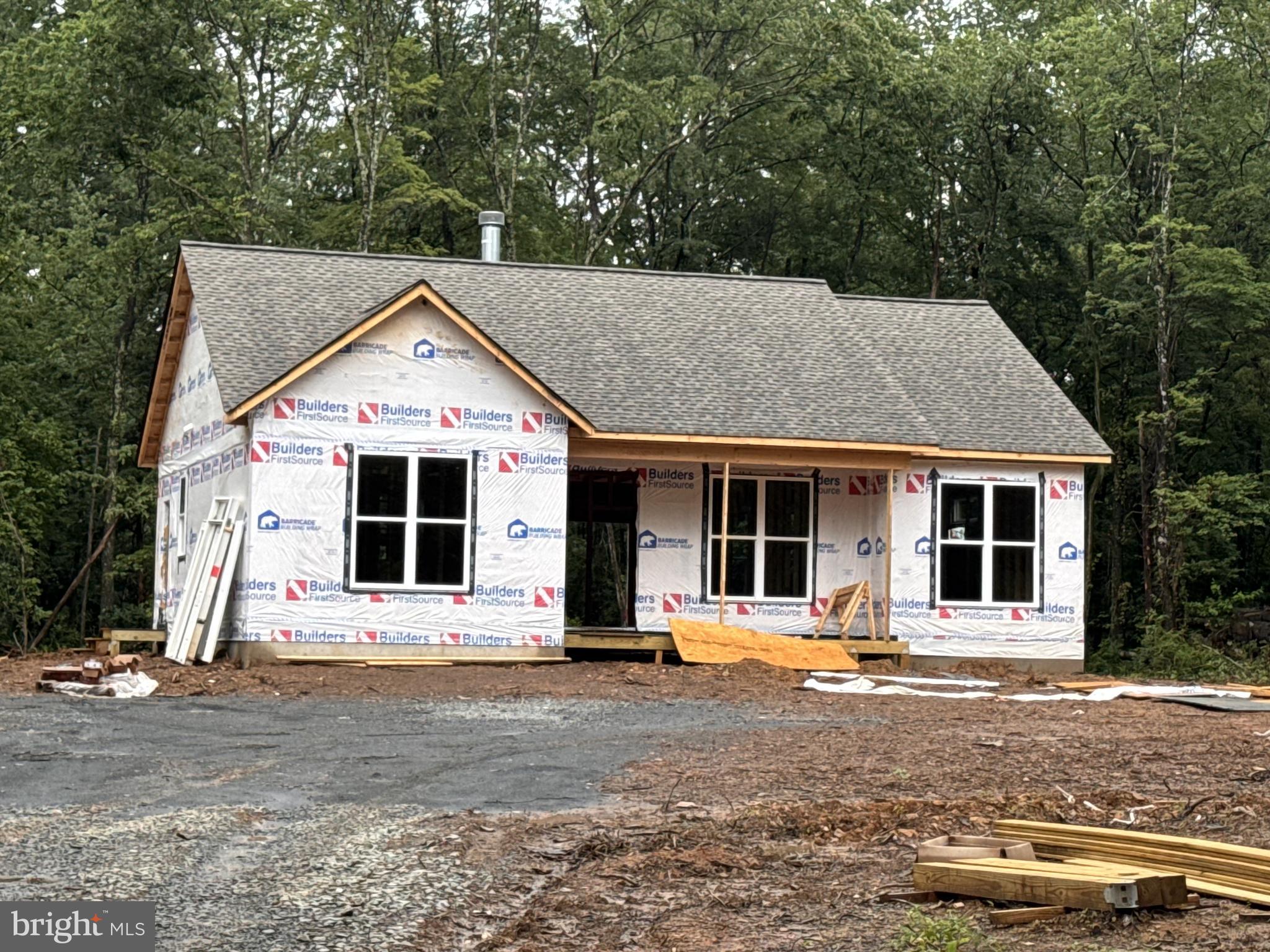 6735 Beverly Road Broad Run, VA 20137 - Photo 4 of 31 a front view of a house with a yard