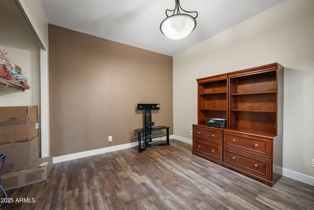 a bedroom with a bed and furniture