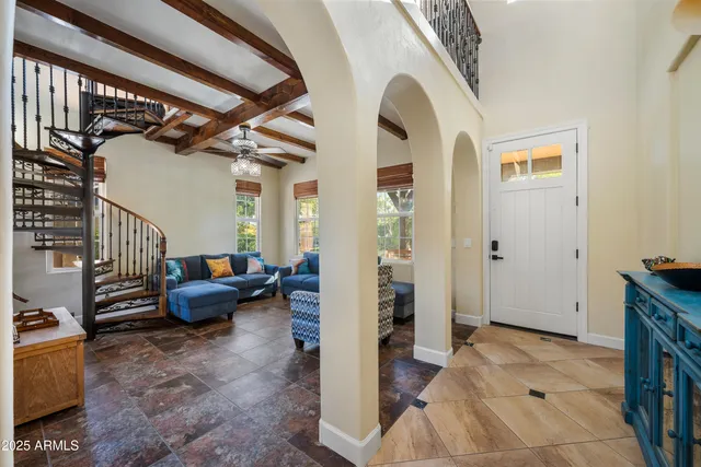 a living room with furniture and a couch