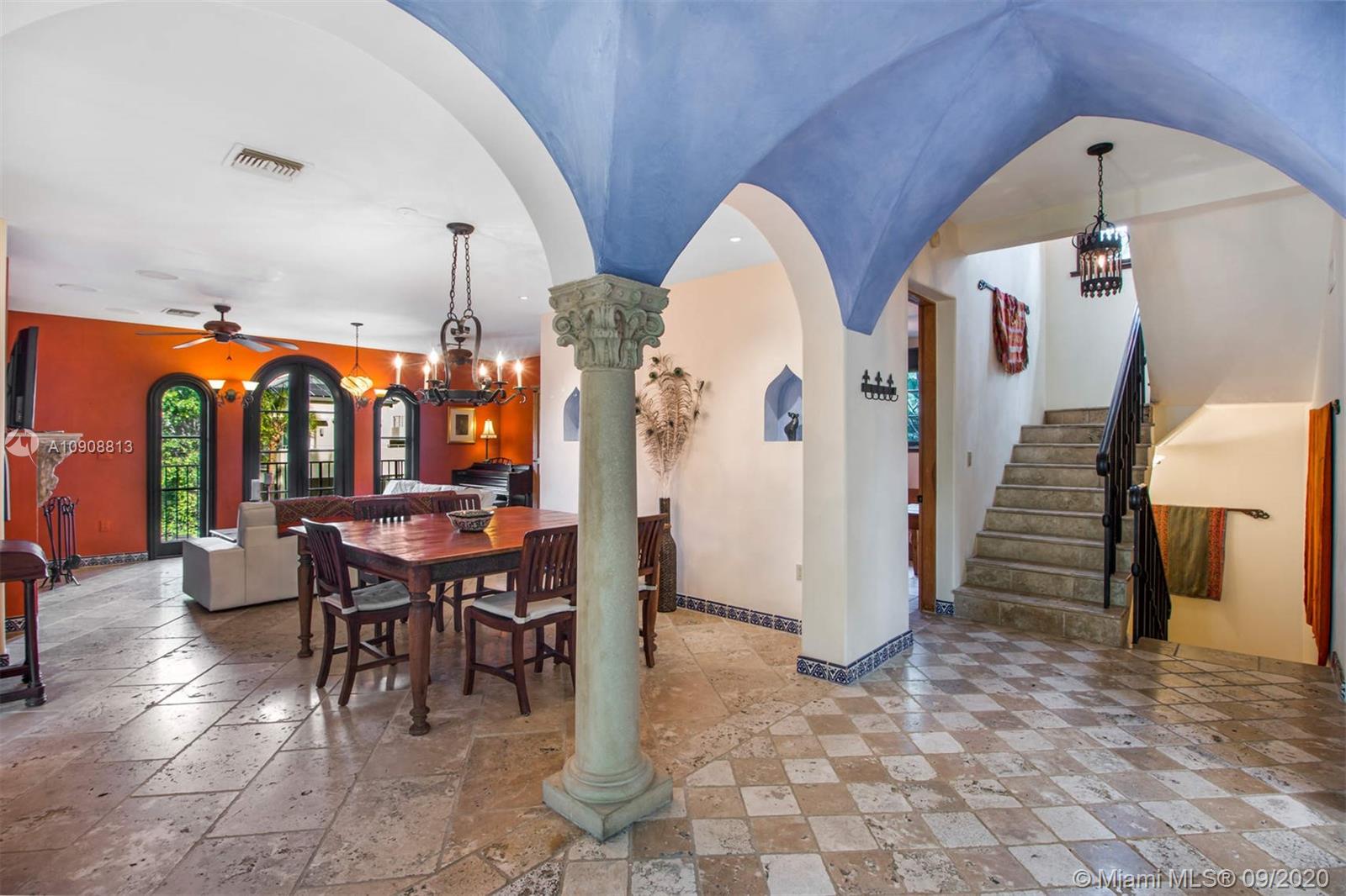385 Ridgewood Road Key Biscayne, FL 33149 - Photo 13 of 54 a view of a dining room with furniture