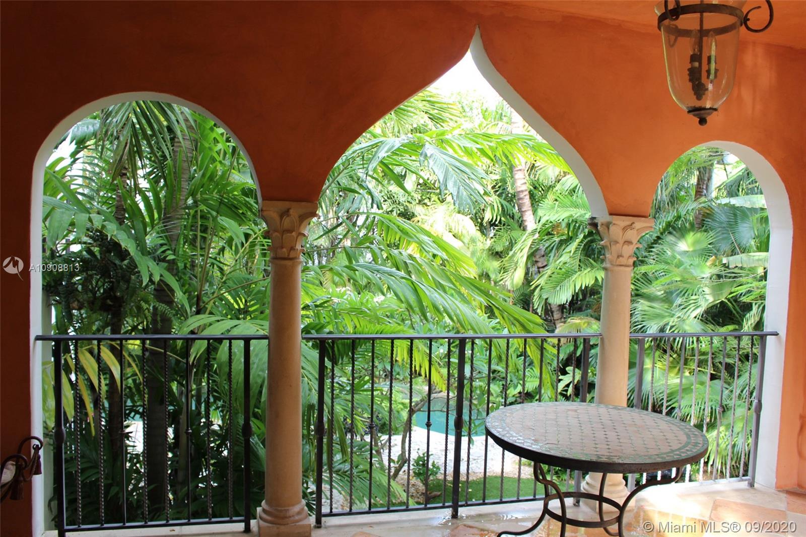 385 Ridgewood Road Key Biscayne, FL 33149 - Photo 20 of 54 a view of a chairs in balcony