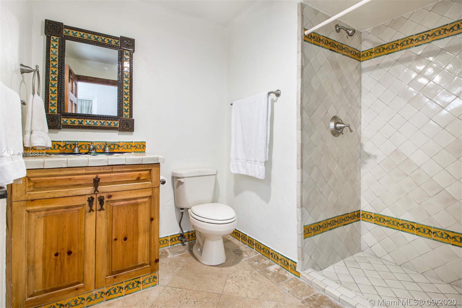 385 Ridgewood Road Key Biscayne, FL 33149 - Photo 41 of 54 a bathroom with a sink toilet and shower