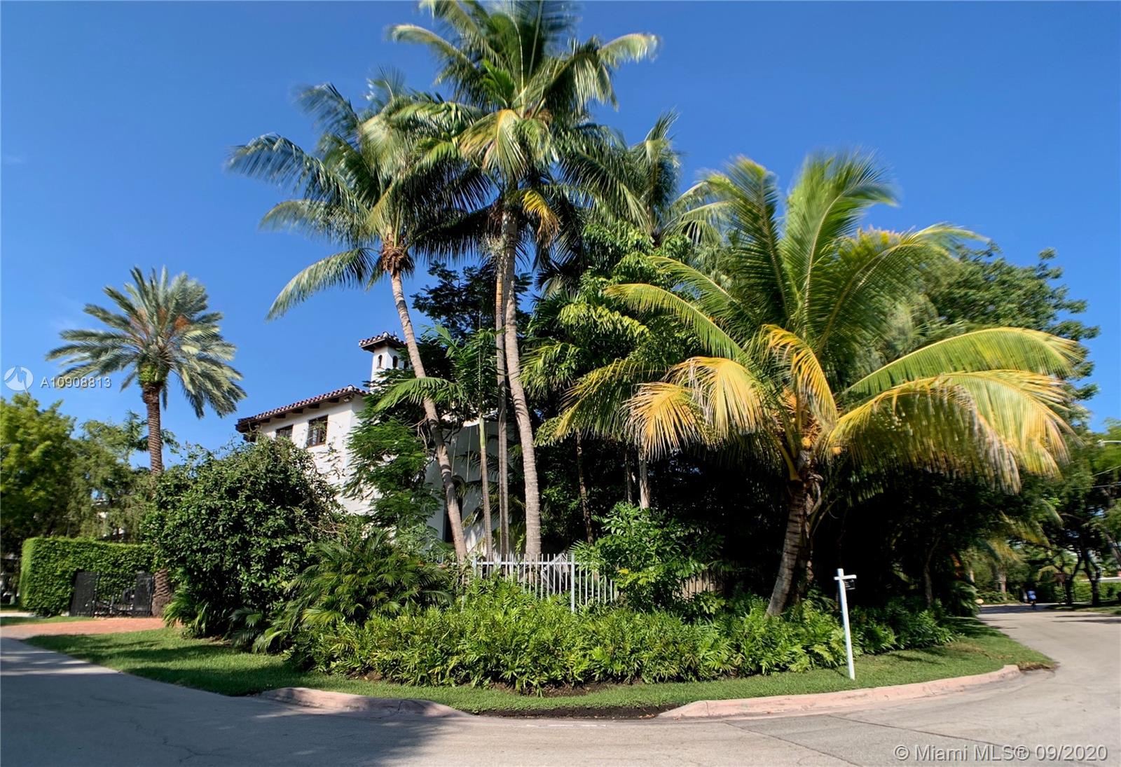 385 Ridgewood Road Key Biscayne, FL 33149 - Photo 53 of 54 a view of a palm trees in a garden