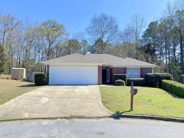 a view of a house with a patio