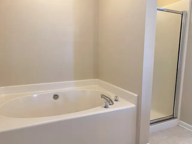 a view of a bathtub in a bathroom
