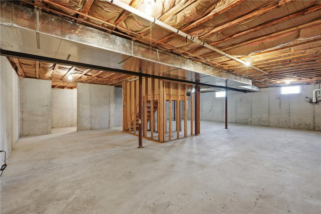 590 Fehr Road Nazareth, PA 18064 - Photo 54 of 79 An unfinished lower level offers concrete floors and exposed timber joists.