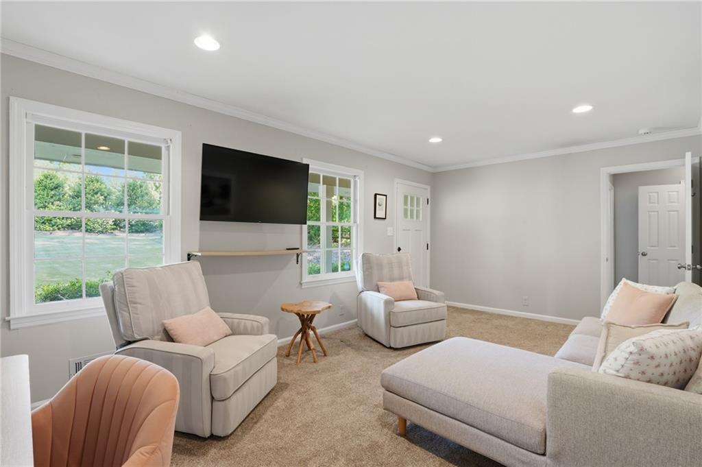 4000 Lower Roswell Road Marietta, GA 30068 - Photo 15 of 25 a living room with furniture and a flat screen tv