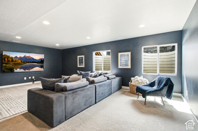 986 South Old Farm Road Heber City, UT 84032 - Photo 32 of 51 Recessed ceiling lighting, two windows with white frames, dark-colored walls, and light-colored carpet flooring