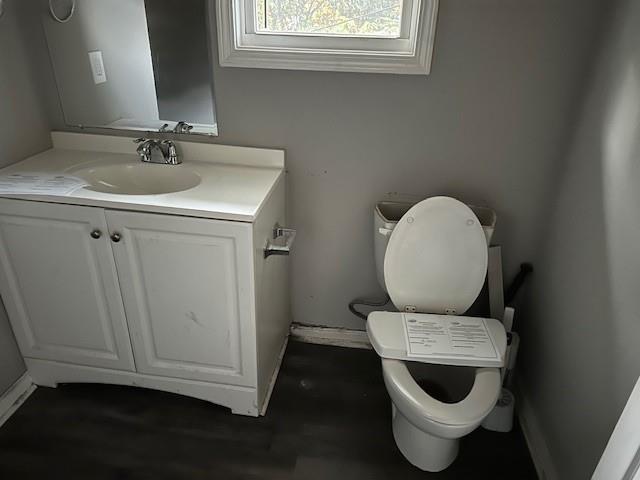 98 5th Street Calhoun, GA 30701 - Photo 9 of 9 a bathroom with a toilet sink and mirror