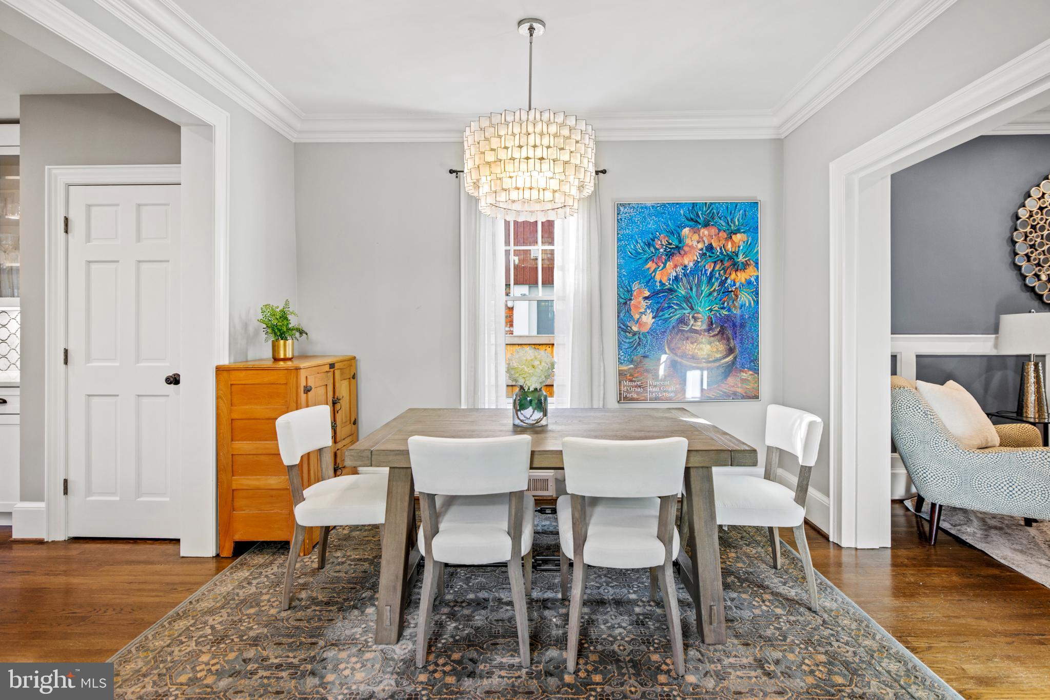 5212 MacArthur Boulevard Northwest Washington, DC 20016 - Photo 14 of 59 a view of a dining room with furniture window and wooden floor