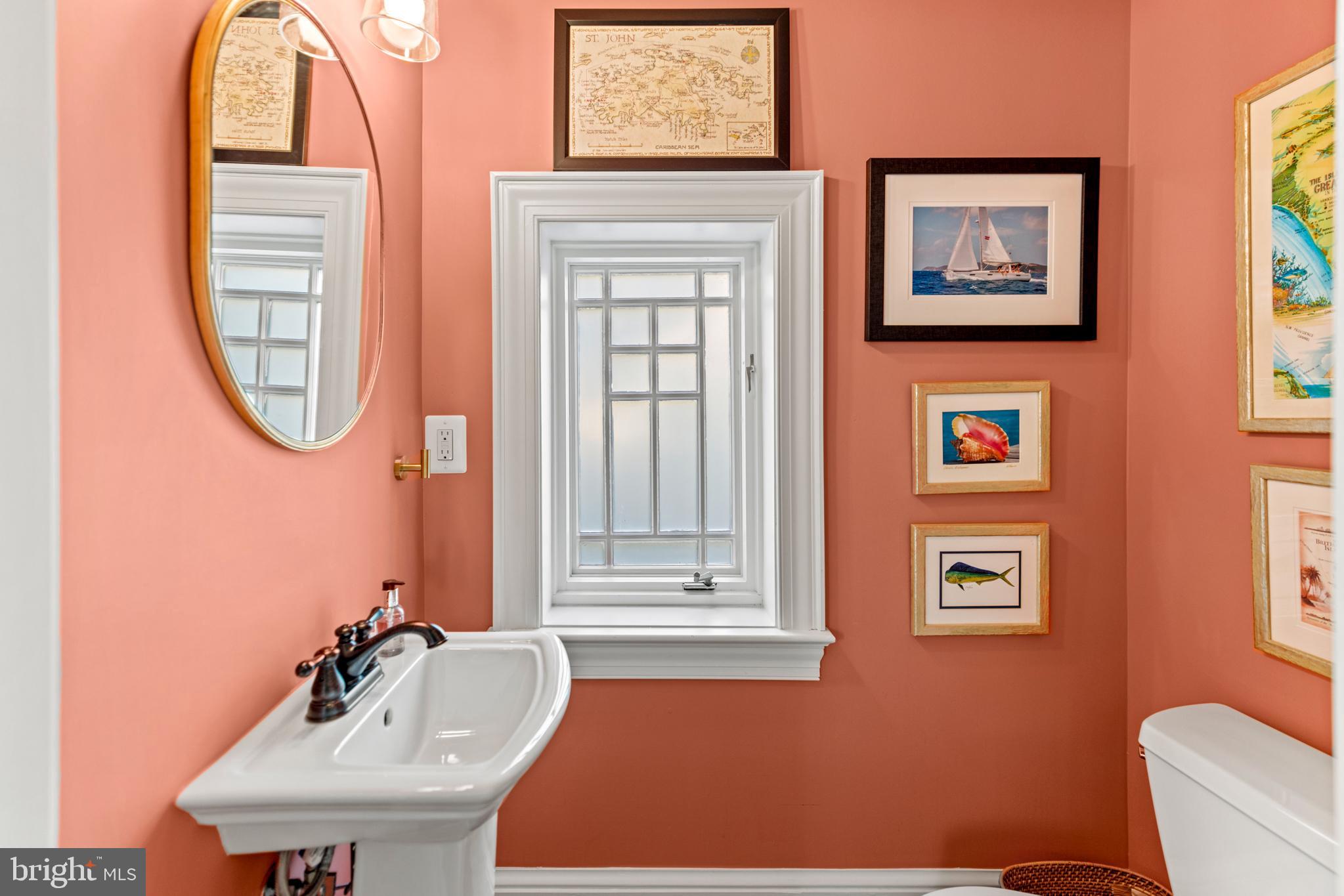 5212 MacArthur Boulevard Northwest Washington, DC 20016 - Photo 16 of 59 a bathroom with a sink and a mirror