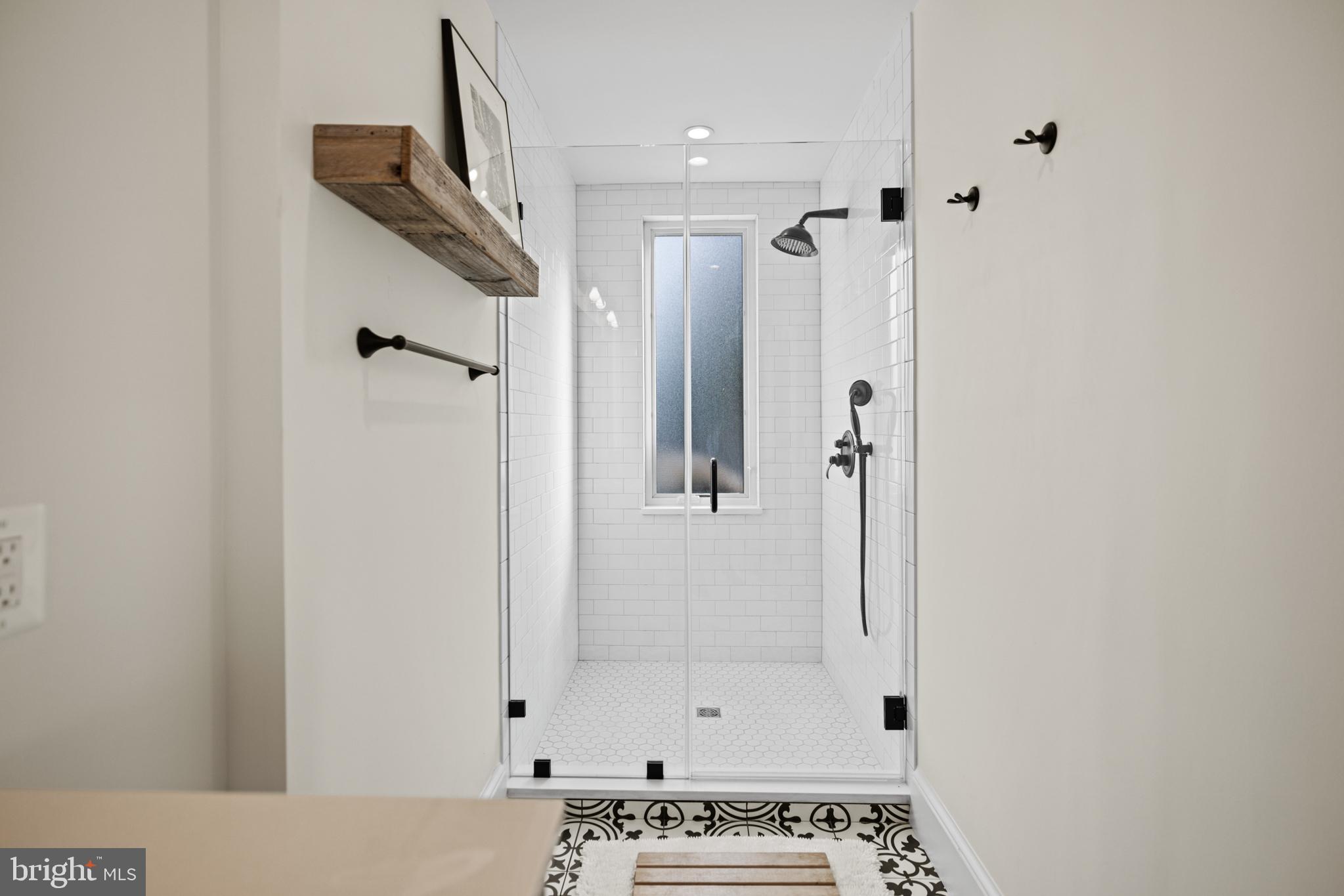 5212 MacArthur Boulevard Northwest Washington, DC 20016 - Photo 28 of 59 a bathroom with a shower