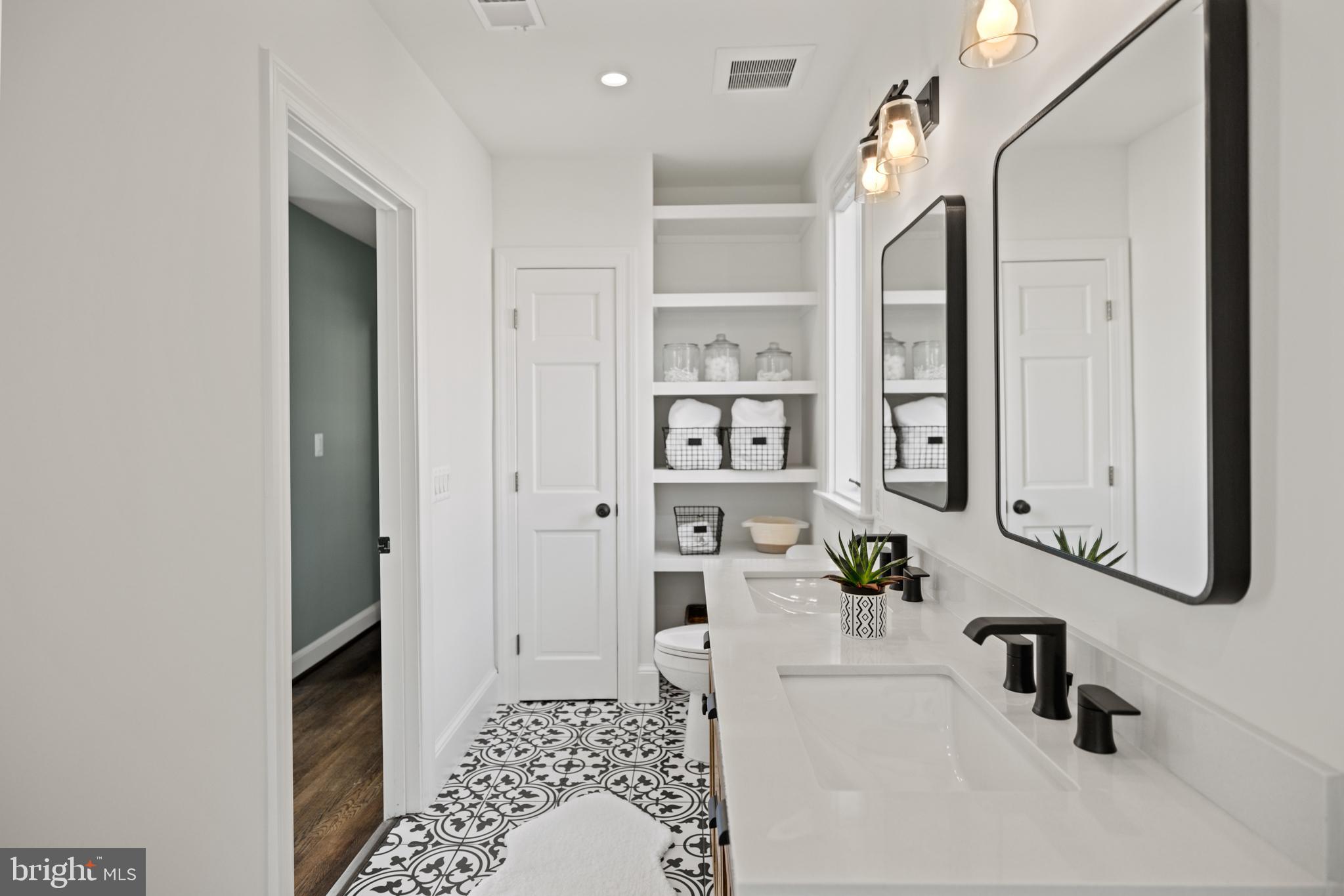 5212 MacArthur Boulevard Northwest Washington, DC 20016 - Photo 29 of 59 a bathroom with a bathtub and a shower