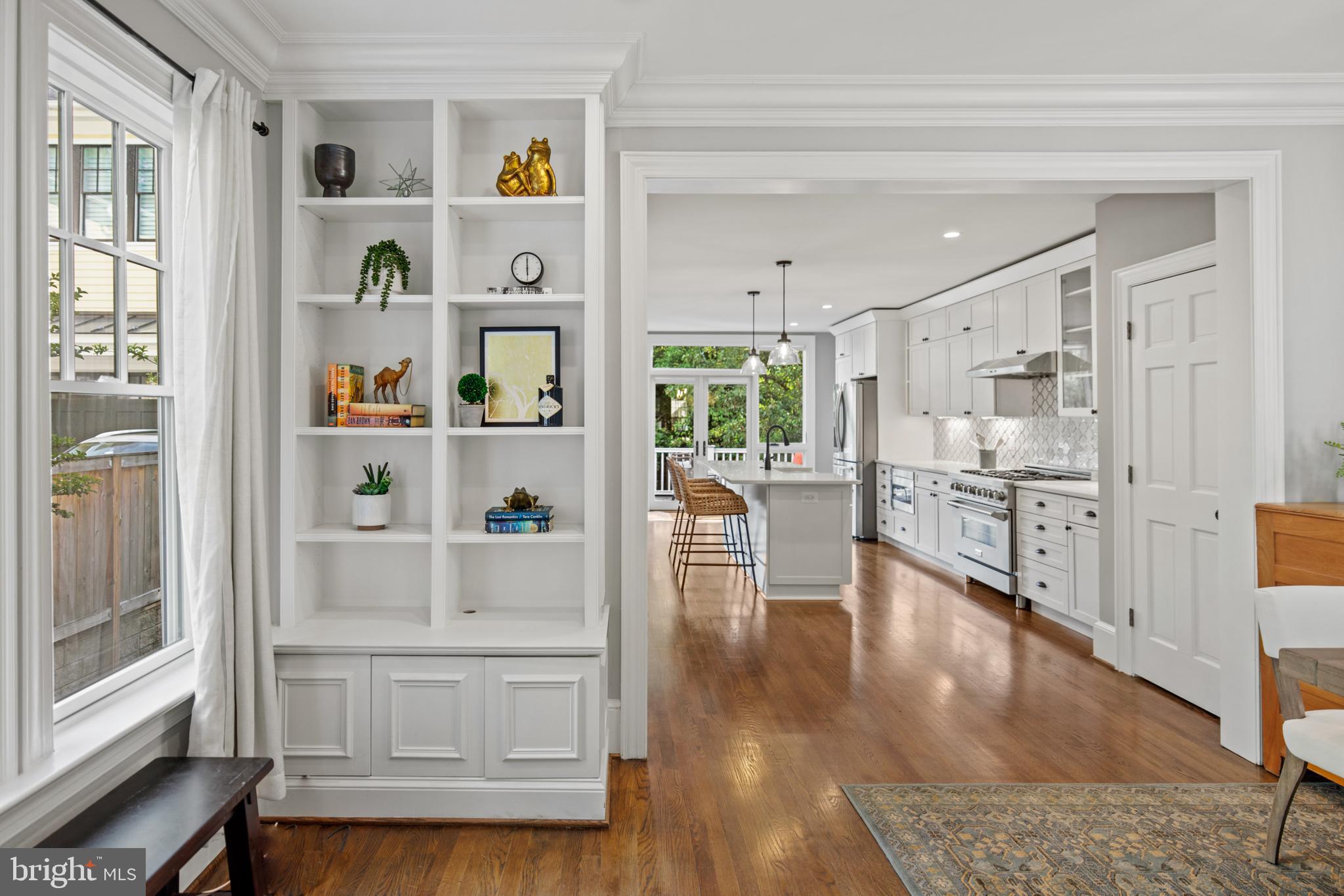 5212 MacArthur Boulevard Northwest Washington, DC 20016 - Photo 3 of 59 a room with stainless steel appliances wooden floor and view living room