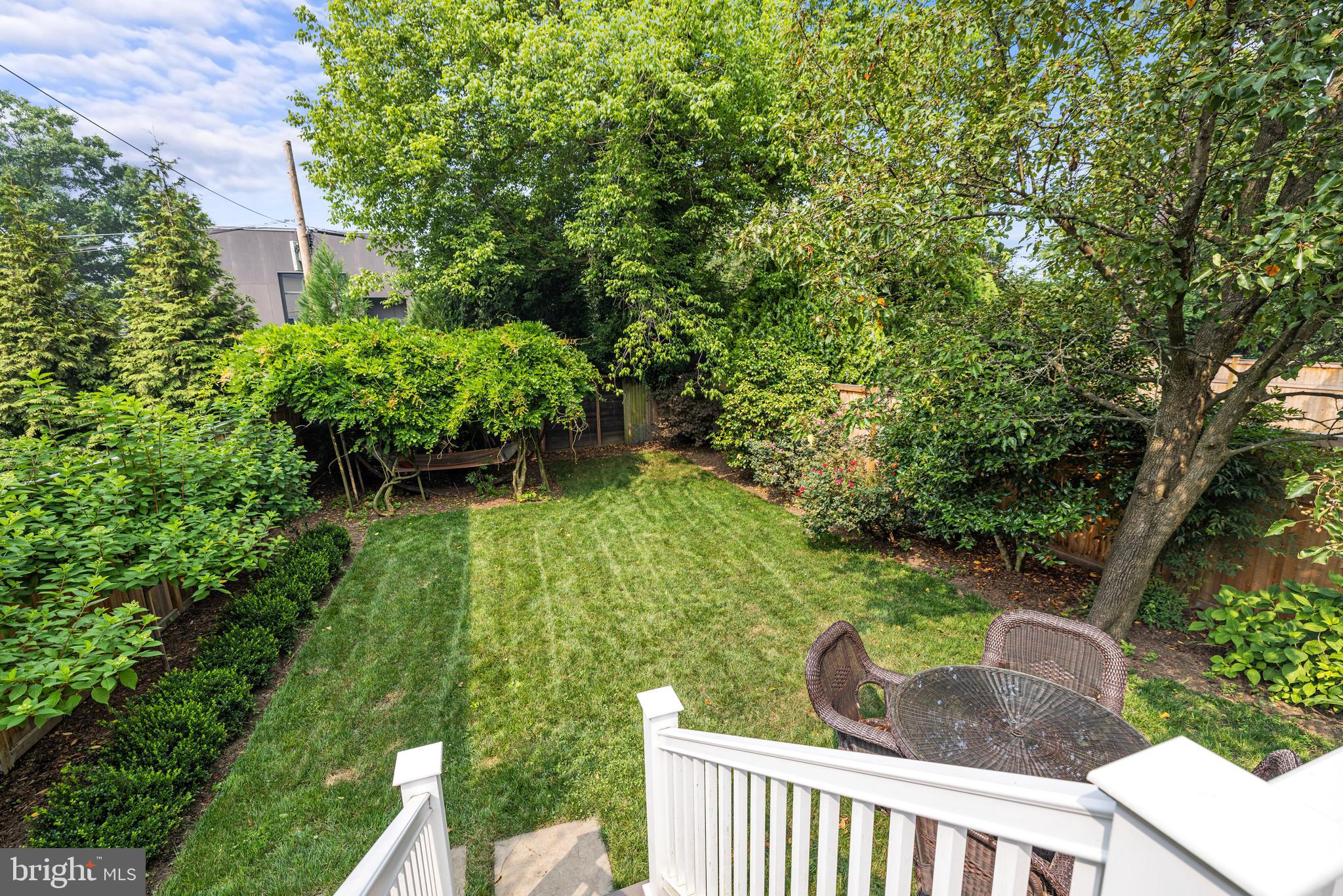 5212 MacArthur Boulevard Northwest Washington, DC 20016 - Photo 37 of 59 a view of a garden from a balcony